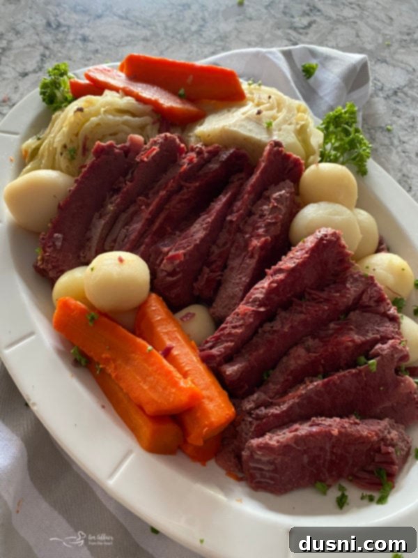 Instant Pot Corned Beef and Cabbage Dinner served on a white platter