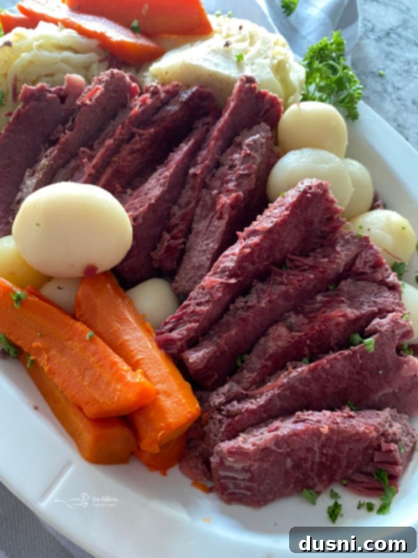 Close up of cooked corned beef and vegetables in an Instant Pot