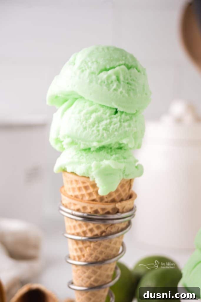 Close-up of homemade Baskin Robbins Daiquiri Ice showing its mint-green color and texture.