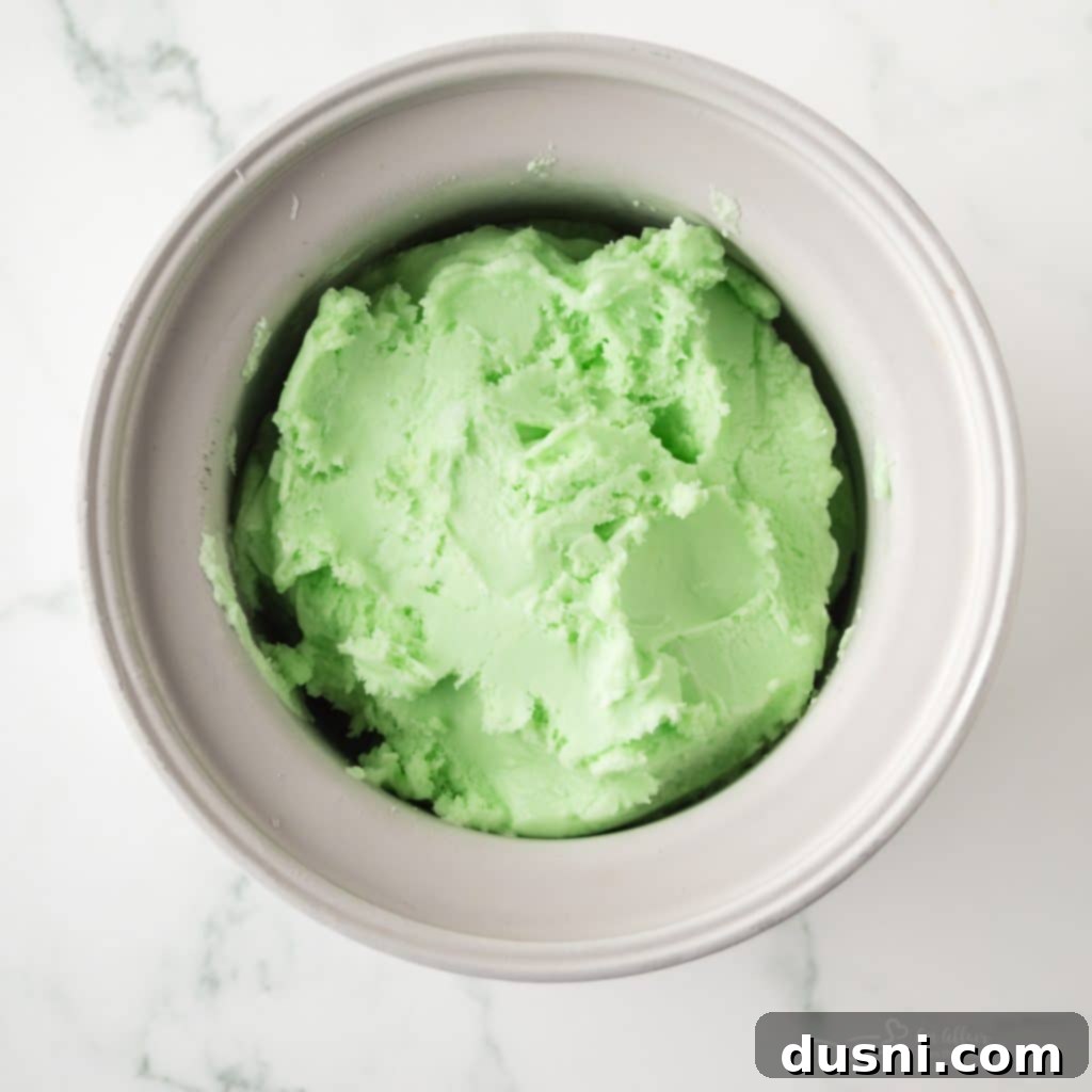 The Daiquiri Ice mixture chilling in a glass bowl in the refrigerator.