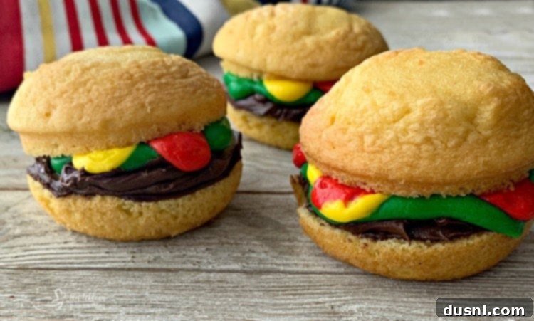 A finished Hamburger Cupcake showing the layers of frosting and the top bun placed on top.