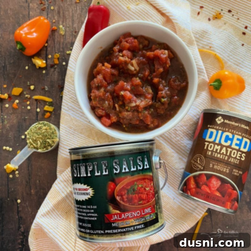 Two breakfast burritos with J&R Simple Salsa in the background