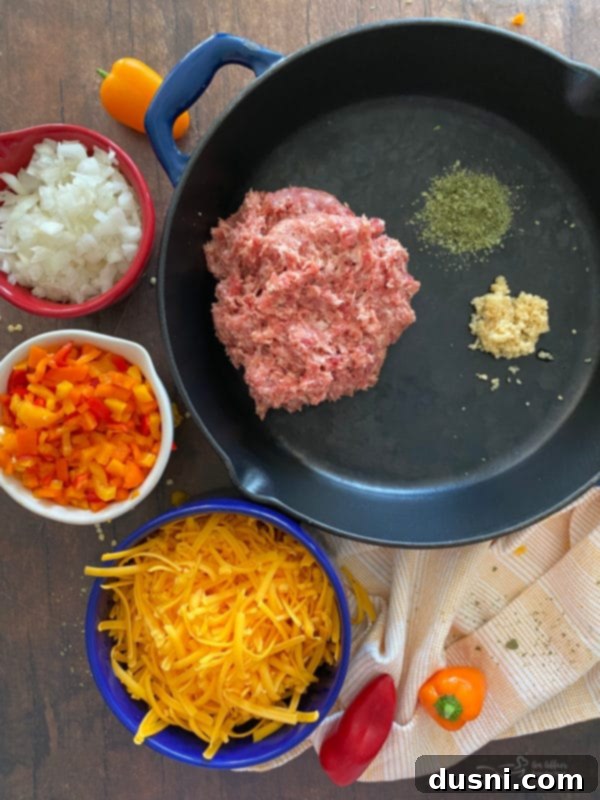 Two hands holding a breakfast burrito