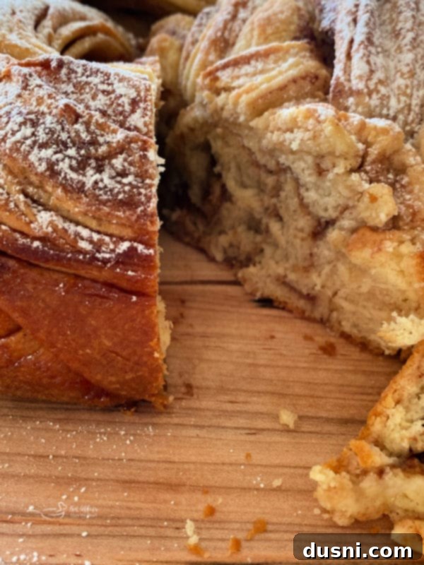 Freshly baked Russian Rose Bread with a golden crust, cooling on a wire rack