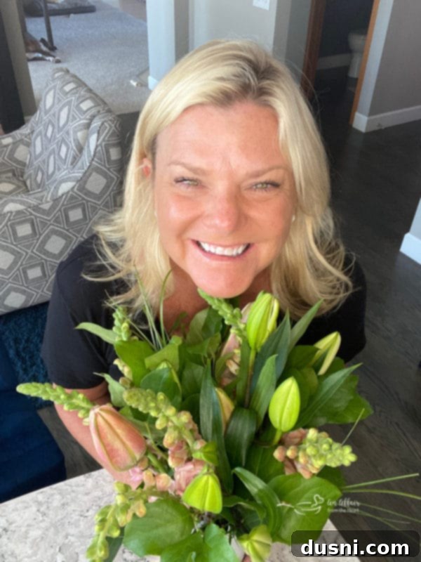 A vibrant bouquet of fresh flowers, including roses, symbolizing floral delivery