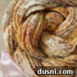 Top view of Russian Rose Bread generously dusted with powdered sugar, ready to be served