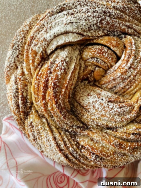 Top view of Russian Rose Bread generously dusted with powdered sugar, ready to be served