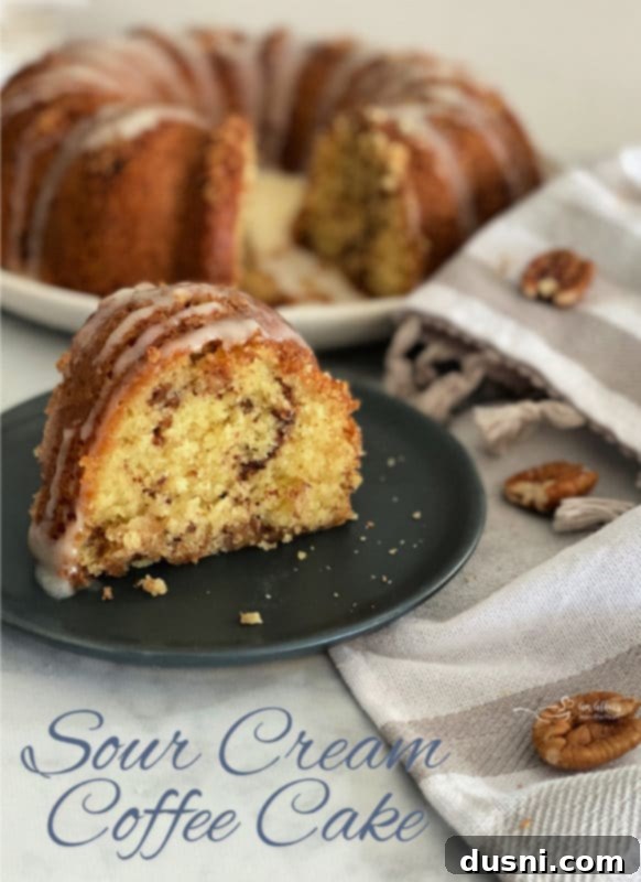 Another beautiful shot of a slice of sour cream coffee cake