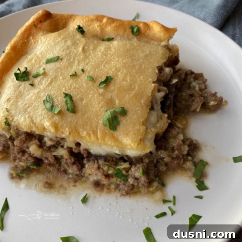 Hearty Swiss Mushroom Runza Bake 3 Close-up of baked Swiss Mushroom Runza Casserole with golden crust