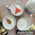 Ekstraktlarla Aromalı Şeker Yapımı 16 A bowl of granulated sugar next to a small bottle of extract, the key ingredients for homemade flavored sugar.