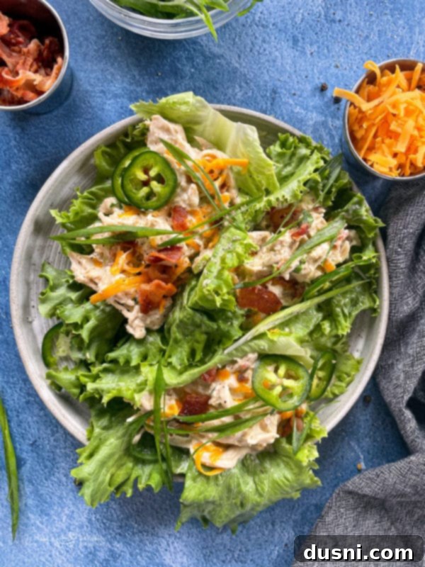 Top view of crack chicken with lettuce and bacon