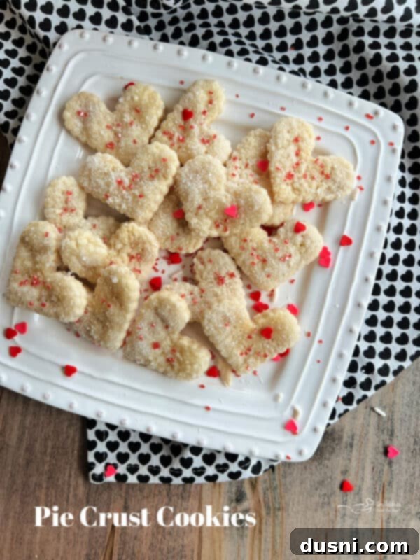 Close-up of golden brown pie crust cookies with sugar topping