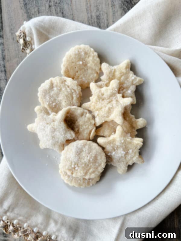 Assortment of heart-shaped and round pie crust cookies with cinnamon sugar