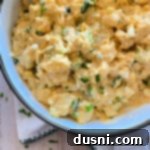 Dorothy's Homemade Potato Salad in a white bowl with a light background.
