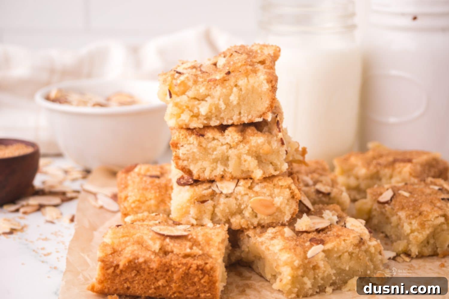 Freshly baked Dutch Letter Bars, glistening with a hint of raw sugar, on a cooling rack