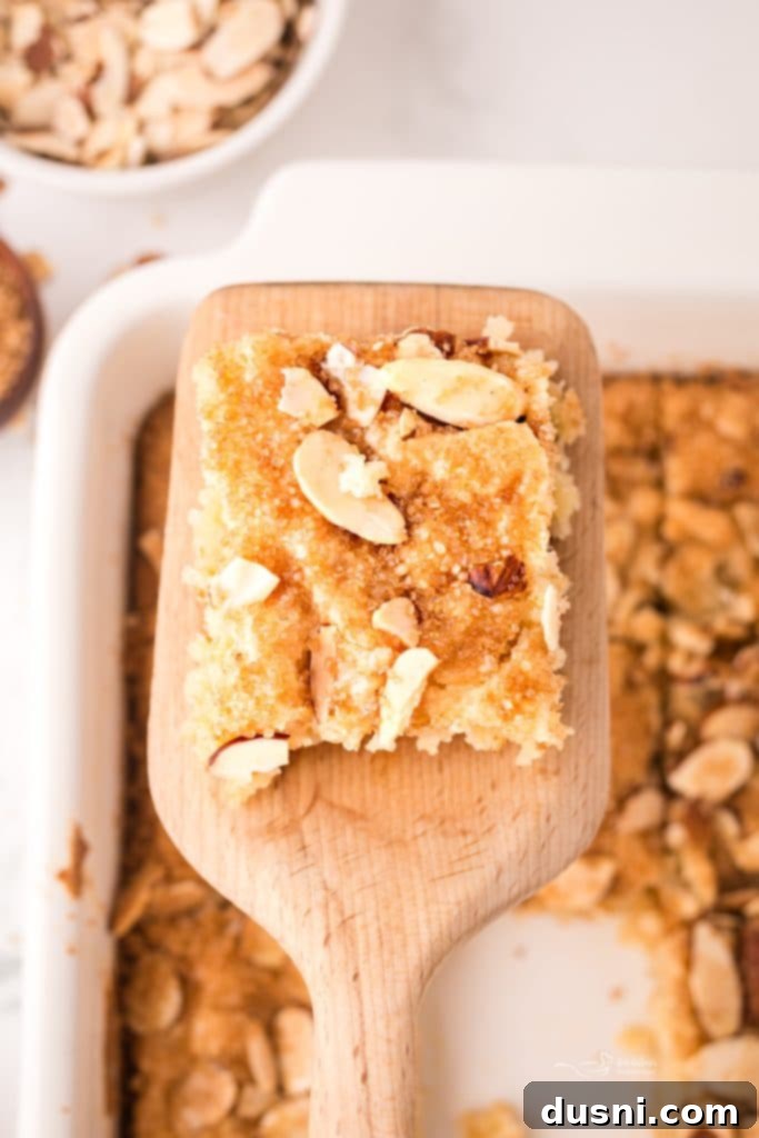 Various ingredients for Dutch Letter Bars laid out, including almond paste, butter, and eggs