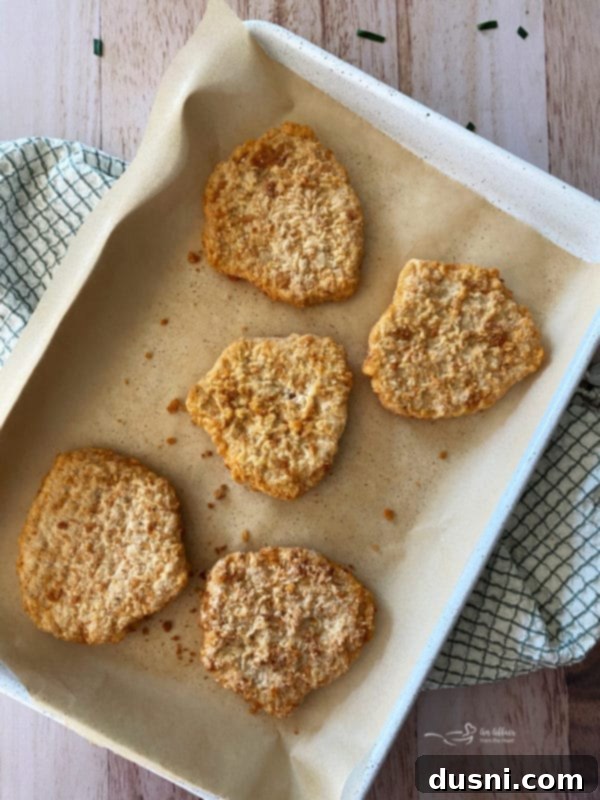 Ultimate Creamy Slow Cooker Mashed Potatoes 15 Southern Style Chicken Fillets baking on a parchment-lined baking sheet
