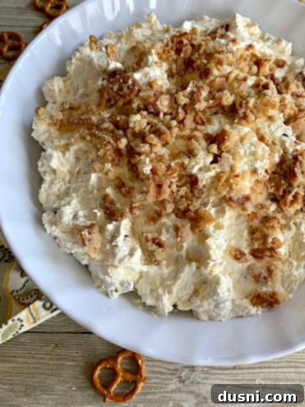 Island Piña Whip 13 Pineapple Pretzel Fluff in a white bowl, a savory and sweet alternative