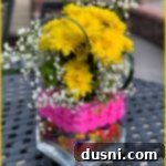 Marshmallow Peep Centerpiece, a festive Easter decoration with candy and flowers.