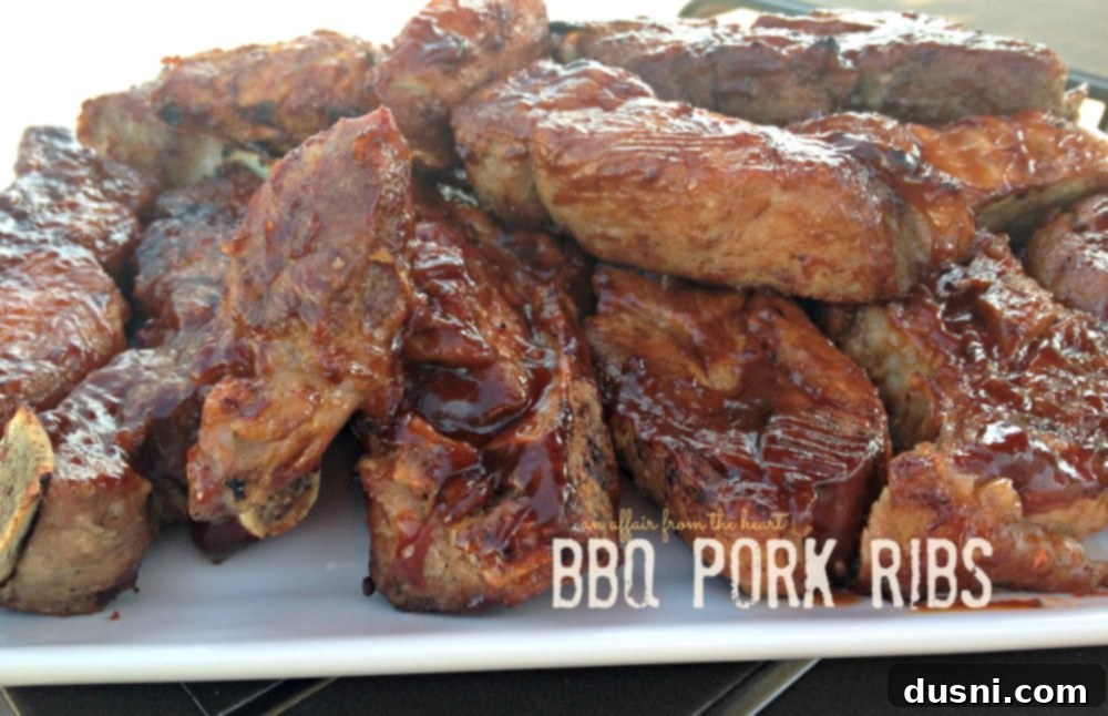 BBQ Pork Ribs, glazed and piled high on a platter