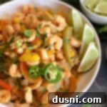 Cilantro Lime Shrimp Sheet Pan Fajitas in a white serving bowl