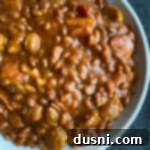 Ultimate Carnivore's Baked Beans 11 Meat Lovers Baked Beans white bowl