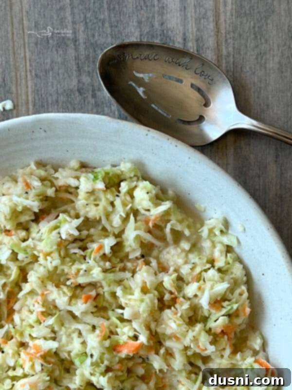 Closeup of shredded cabbage and carrots for KFC Copycat Coleslaw