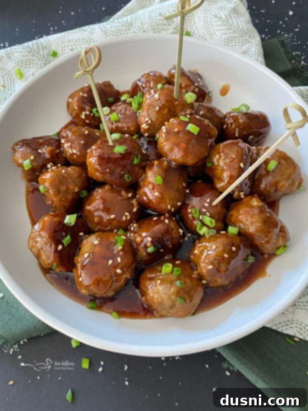 Sticky Asian Meatballs served as appetizers with toothpicks