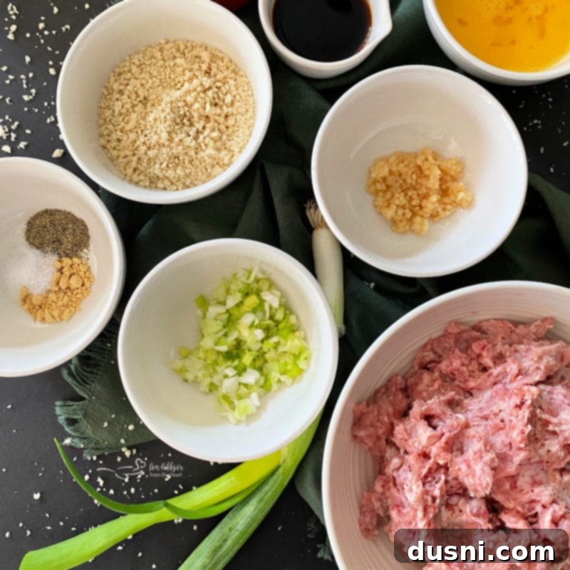 Ingredients for Asian Meatballs laid out on a cutting board