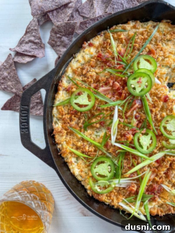 jalapeño popper dip with jalapeño on top 