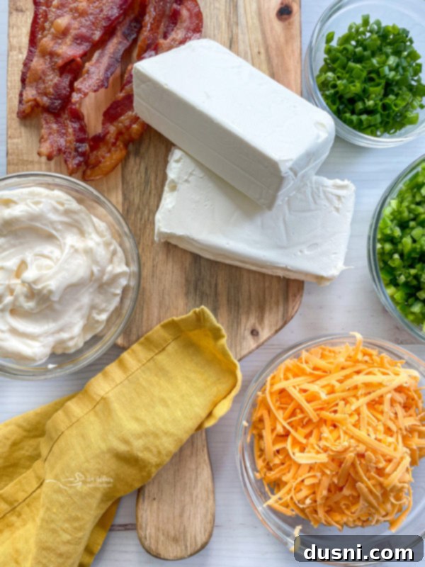 cream cheese, cheddar cheese, sour cream, fresh herbs, green onions, bacon