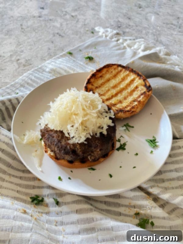 Adding extra Frank's Kraut to a Swiss Cheese Krautburger