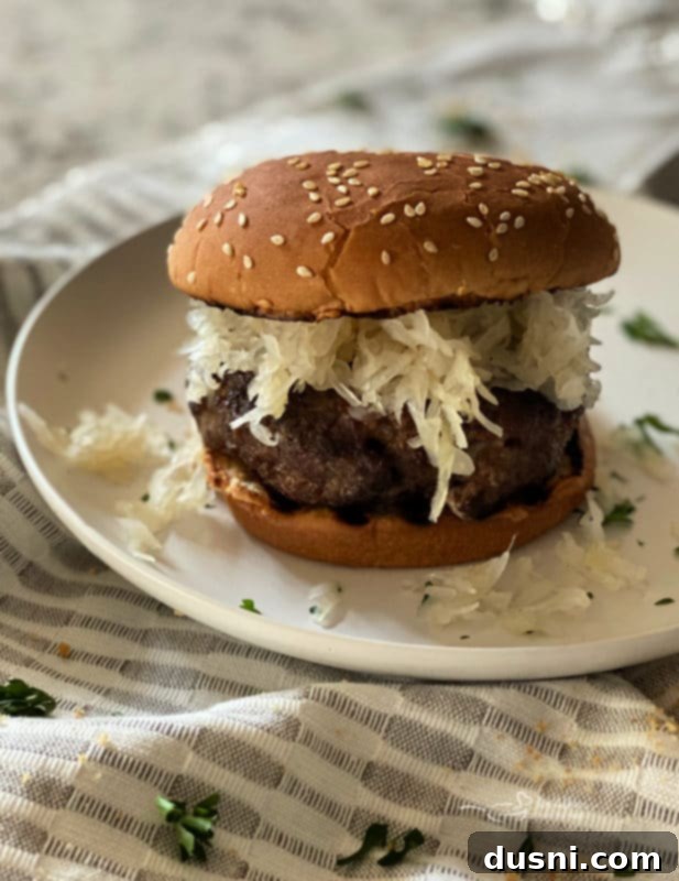 Finished Swiss Cheese Krautburger with condiments