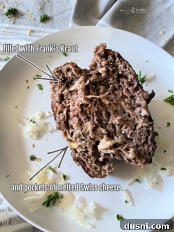 Cross-section of a Swiss Cheese Krautburger showing melted filling