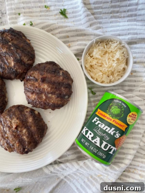 Close-up of grilled Swiss Cheese Krautburger on a bun