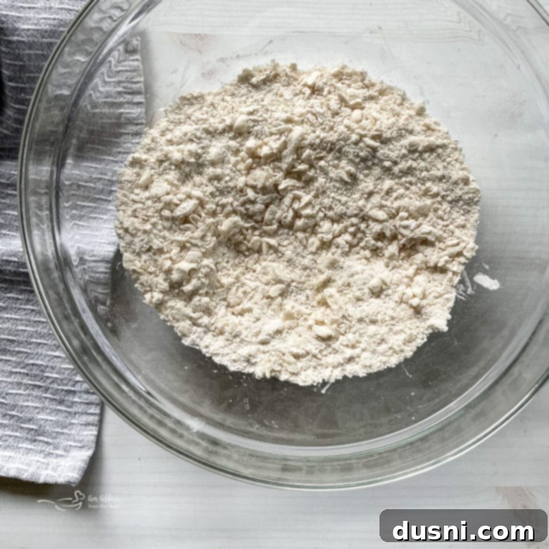 Sifting flour for the pie crust