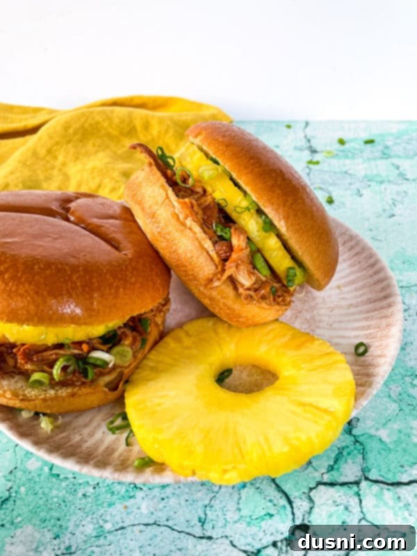 Close-up of shredded Hawaiian BBQ chicken in a slow cooker