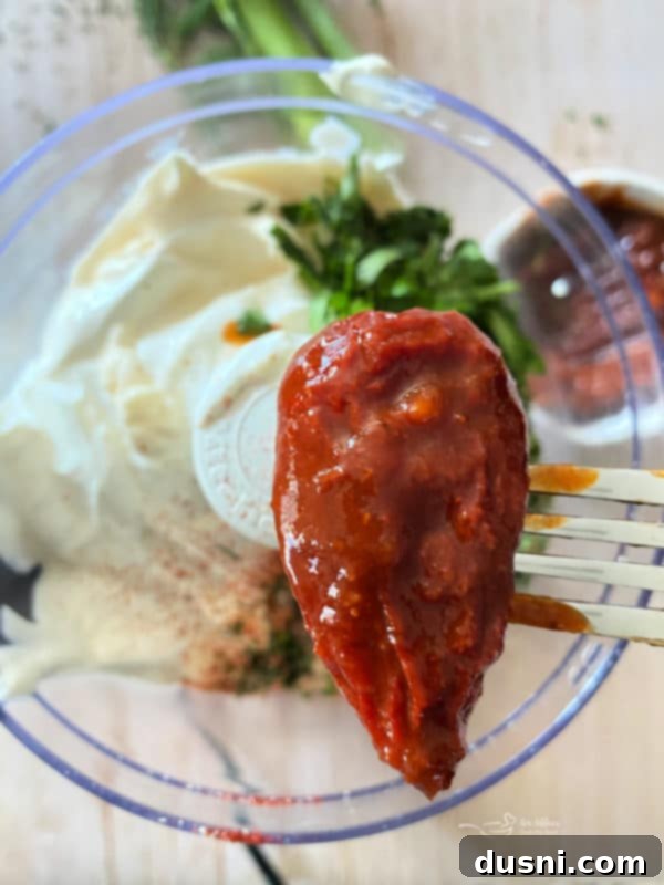 close image of chili pepper in adobo sauce