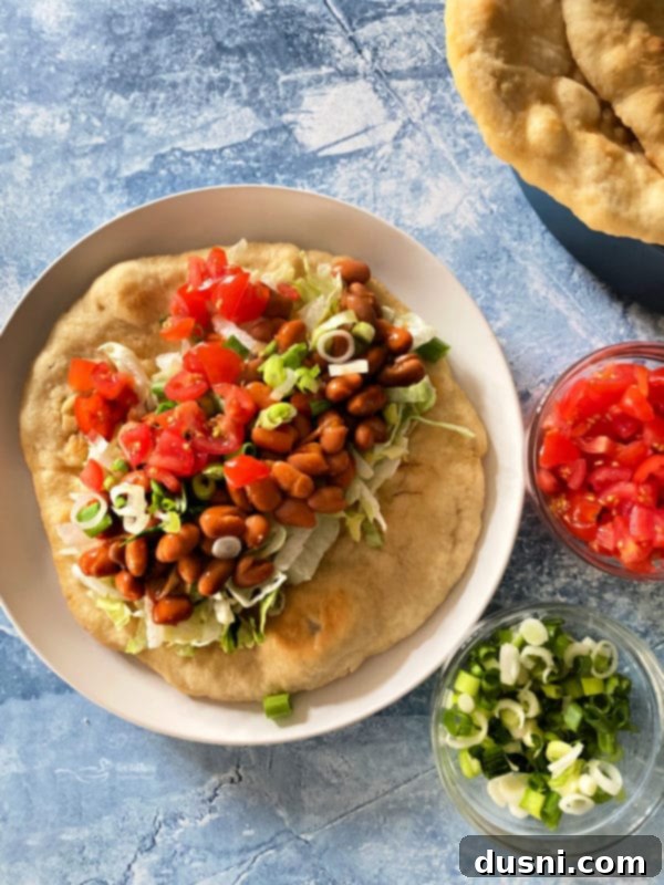 Native Fry Bread Tacos 14 A beautifully arranged plate of Indian Tacos with Indian Fry Bread, ready to be eaten.