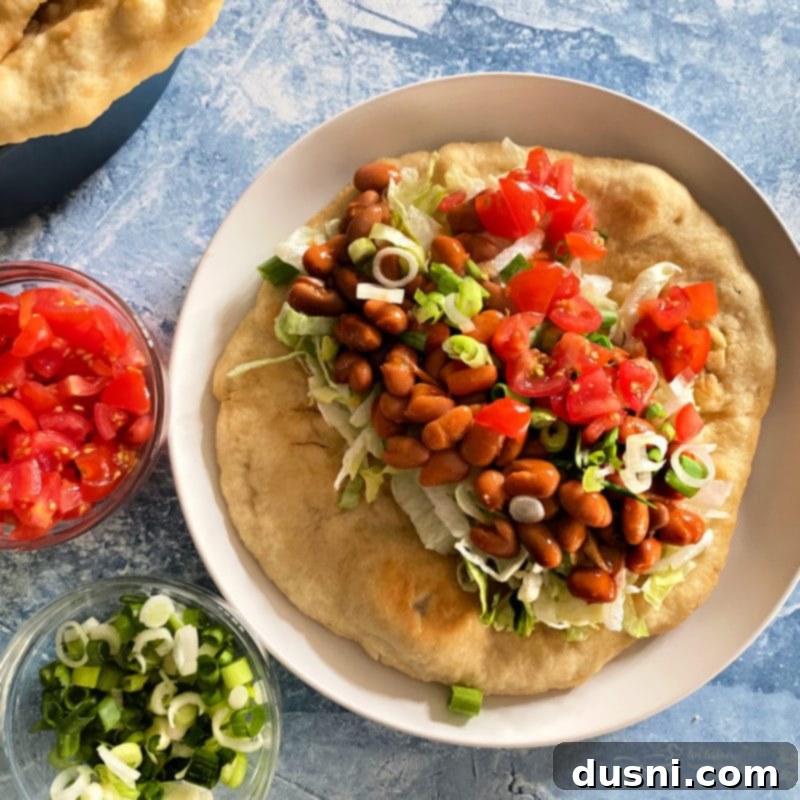 Native Fry Bread Tacos 8 Indian Tacos with Indian Fry Bread, topped with fresh vegetables.