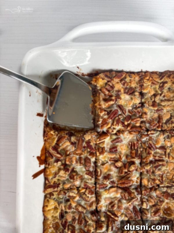 Seven Layer Magic Bars 14 top view of seven layer cookies in baking dish