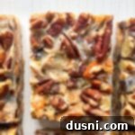 Seven Layer Magic Bars 22 seven layer cookies on white board