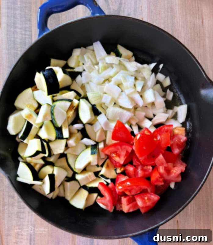 Bonefish Grill Copycat Zucchini and Tomatoes 7 Skillet with melted butter and olive oil for sautéing.