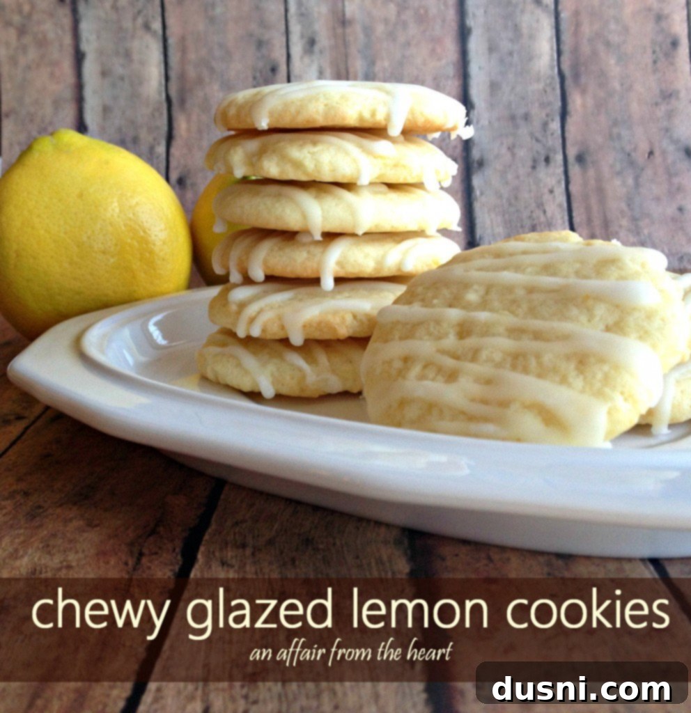 Sunshine Lemon Chewies 4 A stack of perfectly baked and glazed chewy lemon cookies, ready to be enjoyed.