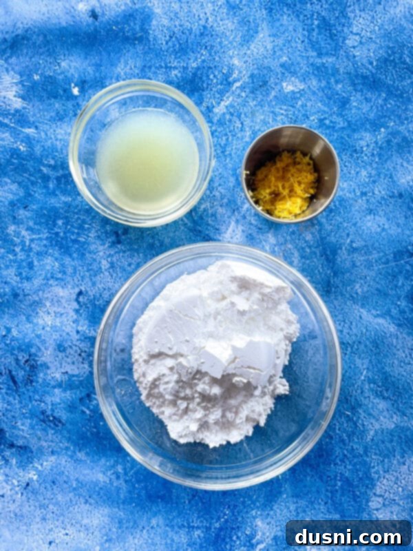 Sunshine Lemon Chewies 7 Ingredients for glazed lemon cookies laid out on a kitchen counter.