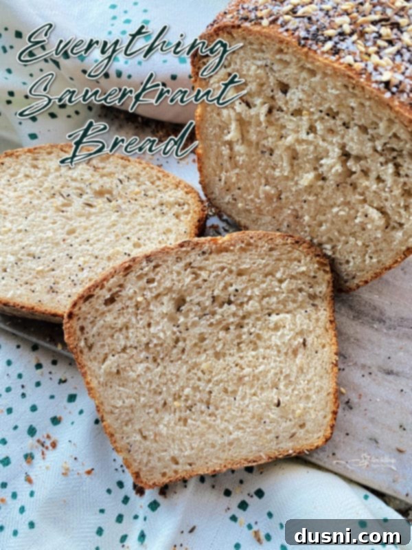 A beautifully textured slice of Everything Sauerkraut Bread, ready for serving.