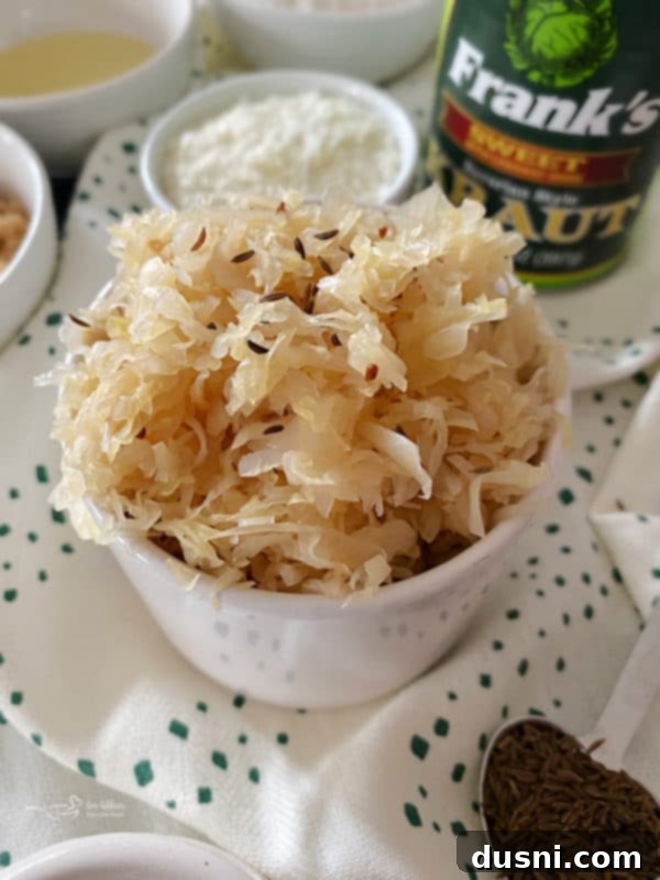 A close-up of the crust of Everything Sauerkraut Bread, showing the sprinkled Everything Bagel Seasoning.