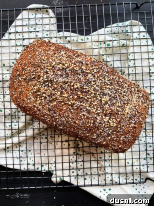 A freshly seasoned loaf of Everything Sauerkraut Bread, ready for baking.