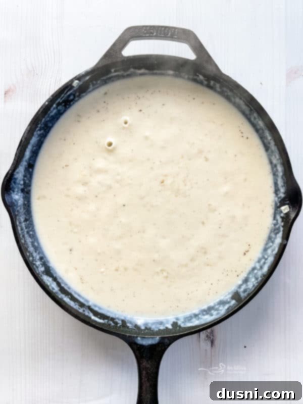 sauce in cast iron skillet for potatoes