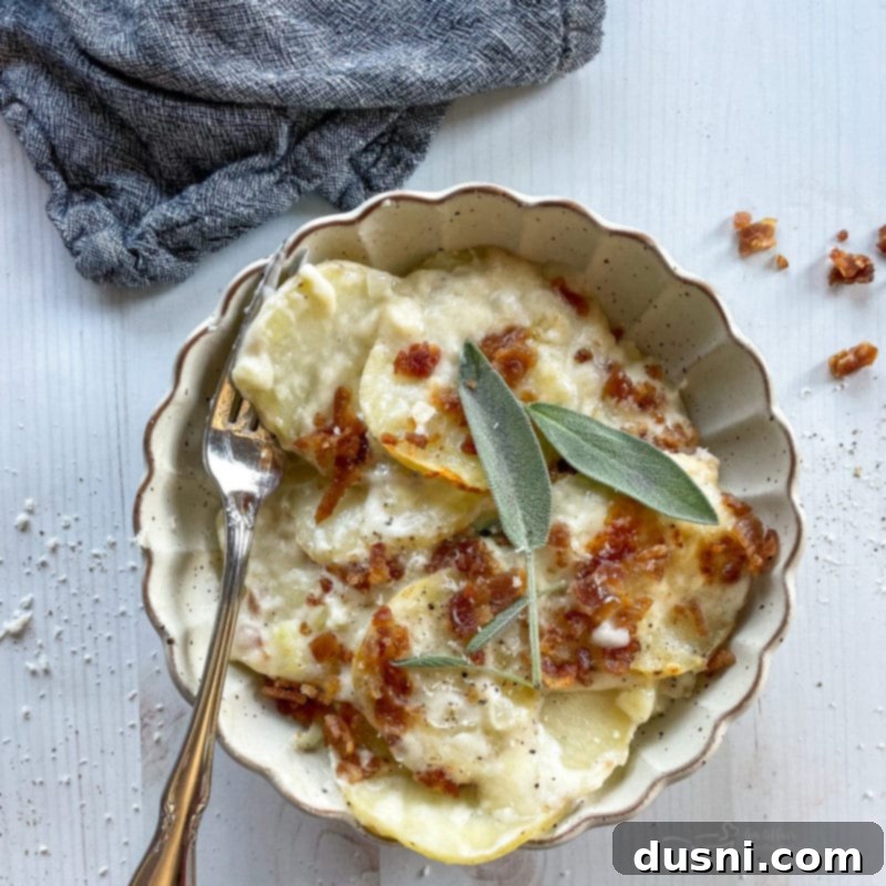 one bowl of potatoes au gratin topped with sage and bacon